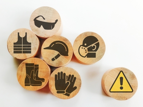icones representando equipamentos de segurança no trabalho e um simbolo de atenção - assaí atacadista
